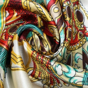 Elegant 90cm silk scarf featuring luxury gold carriage chain and baroque patterns