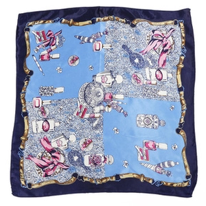 Detailed pattern showing perfume and cosmetics print on blue satin square scarf