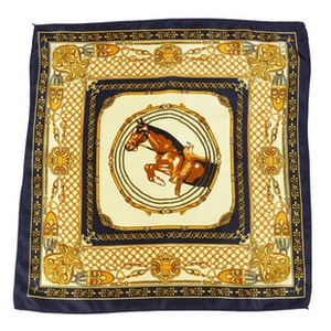 Detail of satin square scarf featuring classical equestrian horse print and blue border