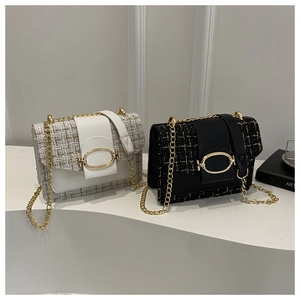 Detail of tweed and leather crossbody bags with golden oval buckles and chain straps