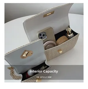 Internal view of straw woven bag set showing spacious capacity for phone and cosmetics