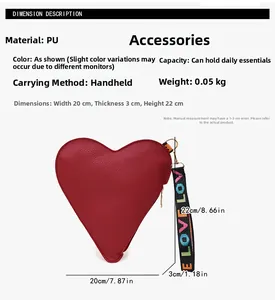 Detail view of red heart-shaped PU bag with litchi texture and LOVE printed strap