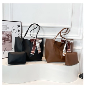 Detail of PU leather tote set with printed silk scarf and matching inner pouch