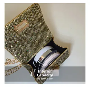 Detail view of the mini gold sequin handbag interior showing capacity for small makeup items