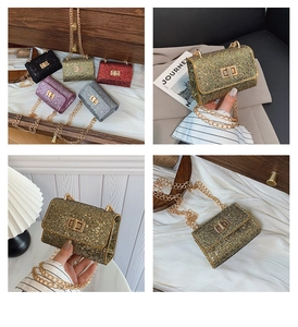 Close-up of sparkling rhinestone mini chain bags with metallic twist locks in five colors