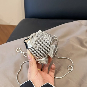 Unique silver fish-shaped evening clutch bag with scale texture and crystal eye detail