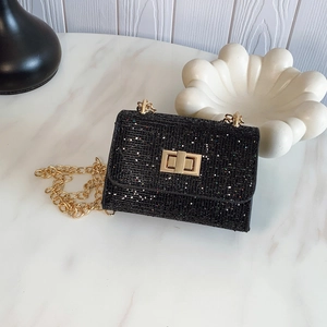 Elegant black sequin mini crossbody bag with gold chain strap and rotary lock