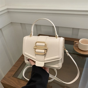 Elegant cream white square leather handbag for women with gold clasp and top handle