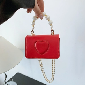 Cute red heart embossed crossbody bag for kids with pearl handle and gold chain