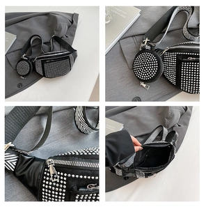 Detail of black rhinestone waist bag with wide geometric strap and mini coin purse