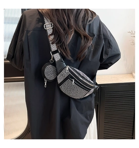 Detail of rhinestone fanny pack with chevron strap and detachable round pouch