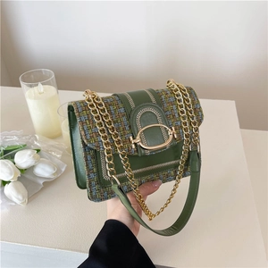 Sac à main élégant en tweed vert foncé et cuir avec bandoulière chaîne dorée