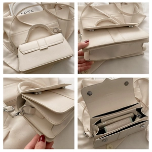 Detail view showing interior space and magnetic closure of off-white crossbody bag
