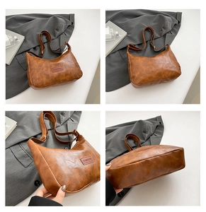 Macro shot of brown faux leather texture and fashion embossing on minimalist tote bag