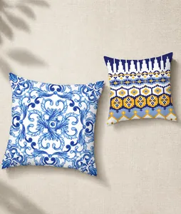 Detailed close-up of ethnic style peach skin cushion covers with geometric patterns