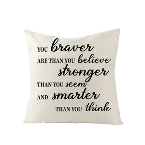 Polyester square throw pillow cover with black inspirational text on cream fabric