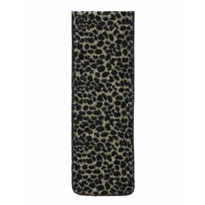 Close-up of thick leopard print scarf showing detailed plush knitted loop yarn texture