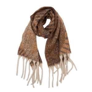 Close-up of thick jacquard knit scarf with brown animal pattern and white tassel fringe