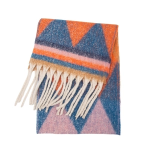 Detail of knit scarf showing orange and blue geometric triangles with long white tassels