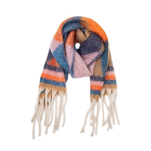 Close-up of thick jacquard knit scarf with colorful geometric patterns and fringe