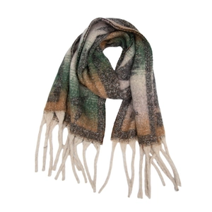 Close-up of thick checkered scarf featuring long fringes and multi-color knit texture