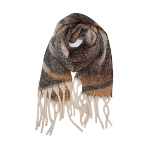 Détail d'un châle à motifs ondulés vintage avec tricot caramel et franges douces