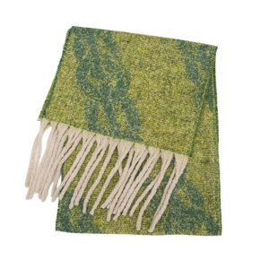Detail view of thick knit scarf with green yellow chain patterns and cream tassels