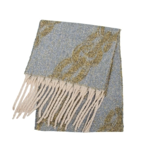 Close-up of chain pattern jacquard texture and thick fringe detail on women shawl