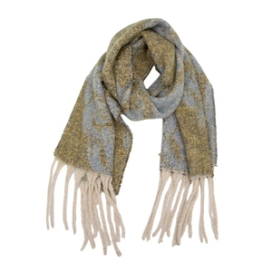 Detailed view of thick knit scarf texture with blue and mustard yarn and long tassels