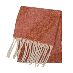 Detailed view of terracota knit scarf fabric with thick white tassel fringe accents