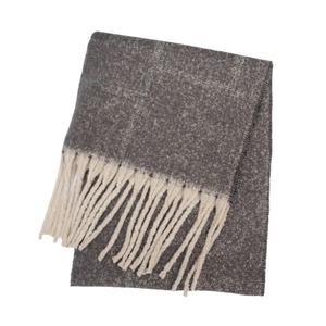 Detail of taupe checkered scarf texture with thick cream tassels on white background