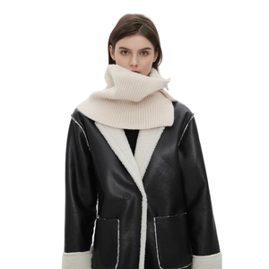 Winter chunky knit buttoned neck warmer in cream white paired with a black aviator coat