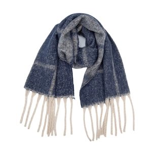 Detail of blue and grey checkered winter scarf with thick cream fringe tassels