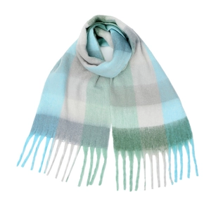 Detail of blue and green checkered mohair scarf featuring long tassels and soft texture