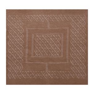 Detail of brown knitted shawl with white geometric diamond patterns and fine weaving