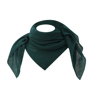 Detailed view of dark green hollow-out knit scarf showing delicate crochet patterns