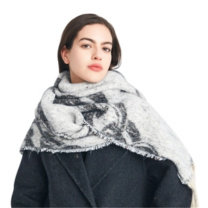 Thick winter shawl scarf with gray abstract jacquard pattern and long tassels