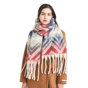 Winter chunky knit scarf with red blue mountain pattern and long fringe tassels