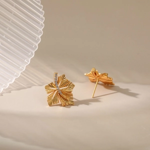 18K gold-plated leaf stud earrings with sparkling cubic zirconia inlay accents