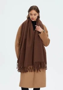 Detail of coffee brown cashmere-feel scarf with long fringe tassels and handmade label