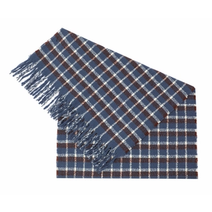 Close-up of thick blue and brown plaid knit scarf with soft tassel detail on white background