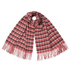 Detailed close-up of blue and red checkered pattern with soft fringe tassels on warm scarf