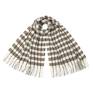 Close-up of winter scarf with blue plaid pattern and dense fringe detail on ends