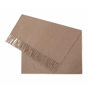 Close-up of solid earth-tone cashmere scarf showing soft knitted texture and handmade tassels