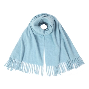 Detailed close-up of light blue knitted scarf texture with decorative fringe tassels