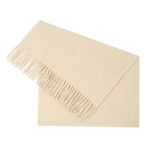Detailed close-up of beige pashmina scarf showcasing soft cashmere texture and fine tassels