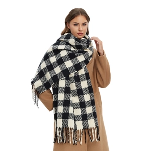 Classic black and white checkered scarf with long tassels for winter outfit