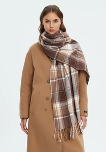 Detail of classic khaki plaid scarf featuring long fringe tassels and handmade woven label