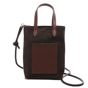 Brown leopard-style faux suede mini tote bucket bag with leather pocket and strap