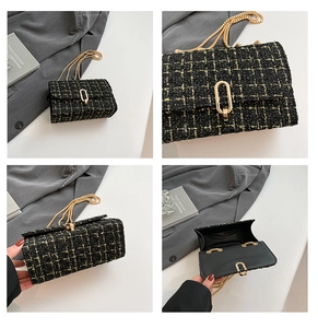 Detail of black tweed plaid shoulder bag with gold chain and oval twist lock clasp